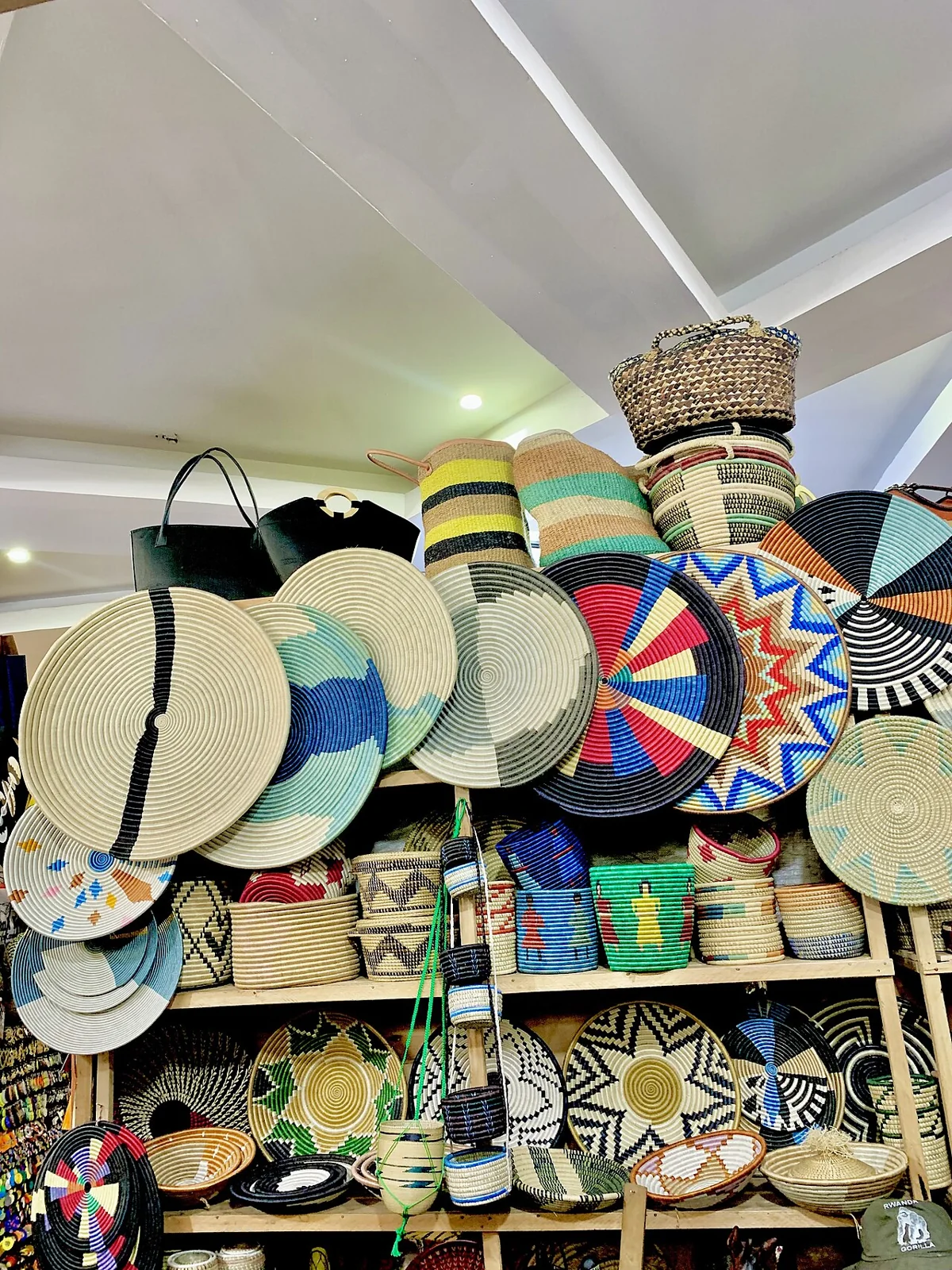 Colourful woven baskets arranged for sale